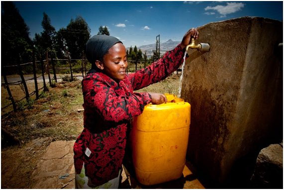 Girl collecting water from one of the wells in Oromia province. Source: A Glimmer of Hope