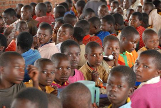 Children in a dining room in Rwanda. Source: Trust and Car