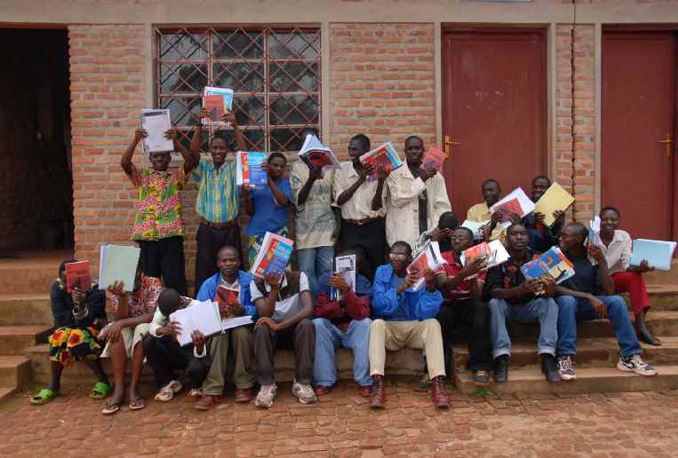 The students are happy with the new books. Source: G3T Foundation