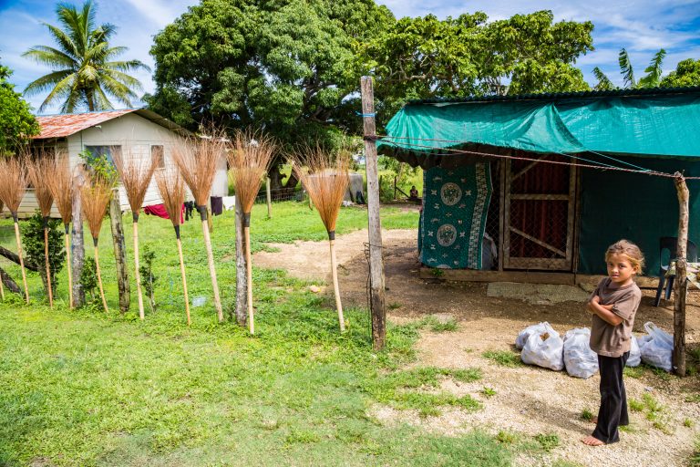 A family selling handmade brooms. Source: Maloff