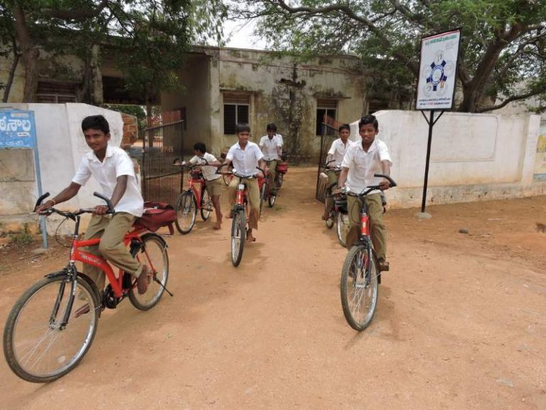 Students leaving school with their bikes. Source: Vicente Ferrer Foundation