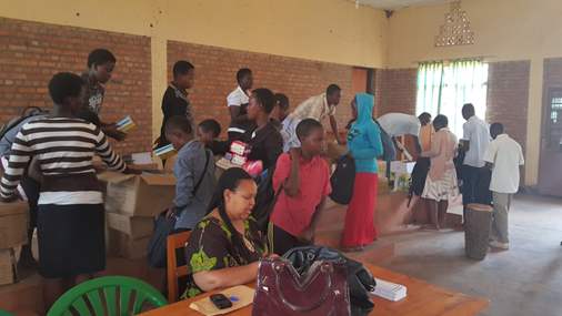 Students collecting their materials. Source: Trust and Care