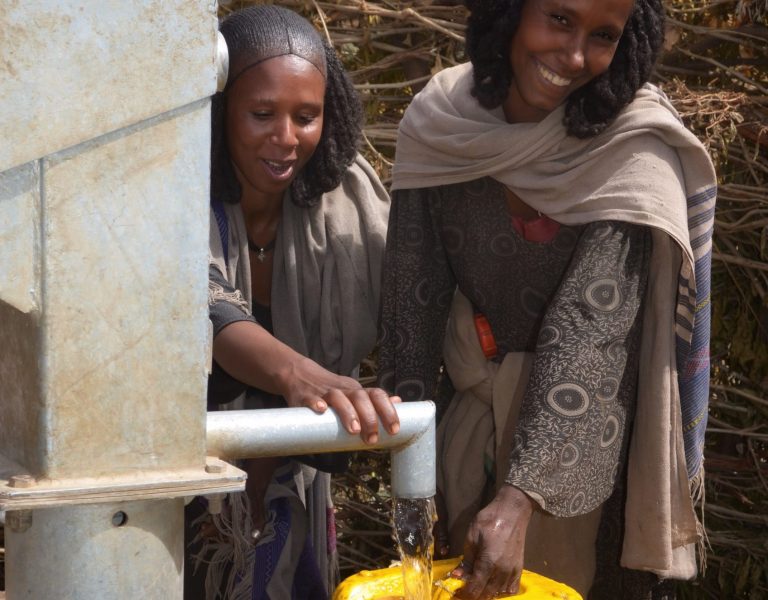 Women collecting drinking water. Source: A Glimmer of Hope