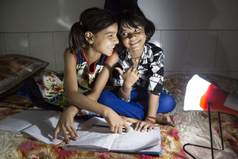 Two girls studying. Source: d.light