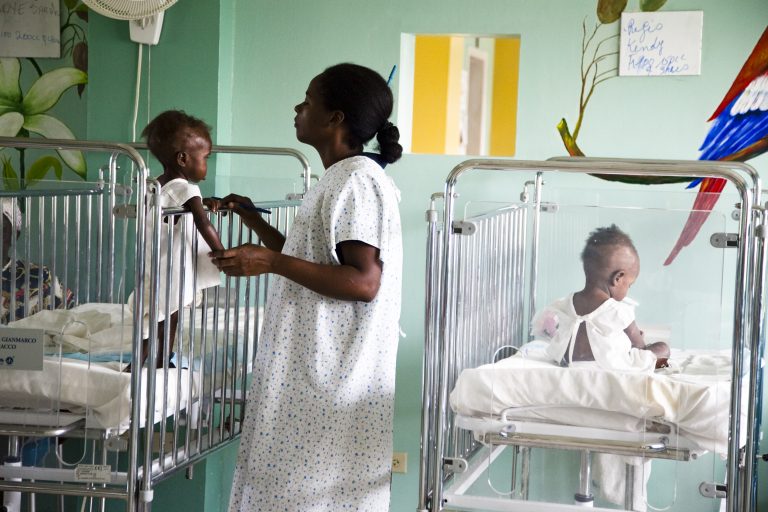 Patient with his mother at St. Damien's Hospital. Source: Our Little Brothers Foundation