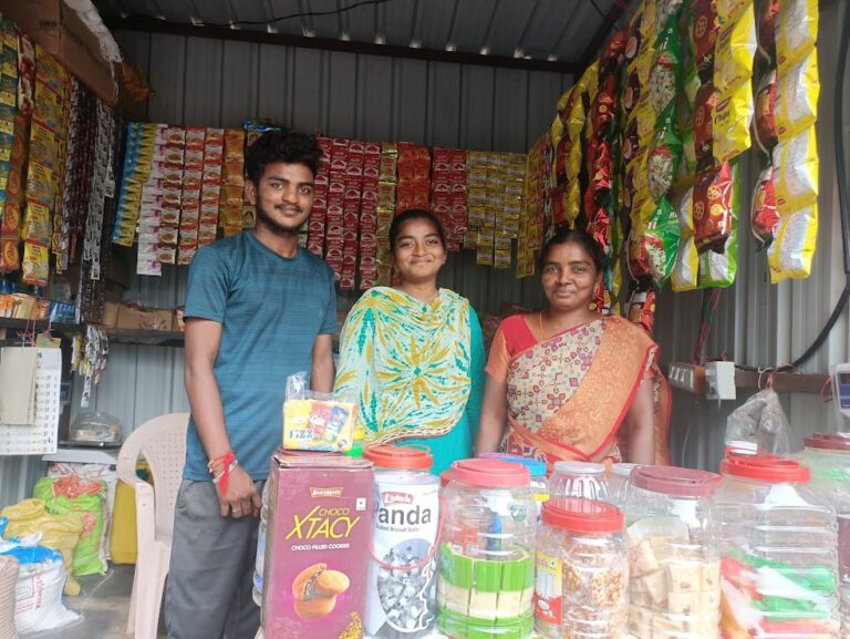 Rajamma with her two sons in her kiosk. Source: Armman