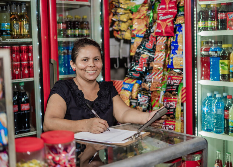 Beneficiary of the investment in her store. Source: FAMA