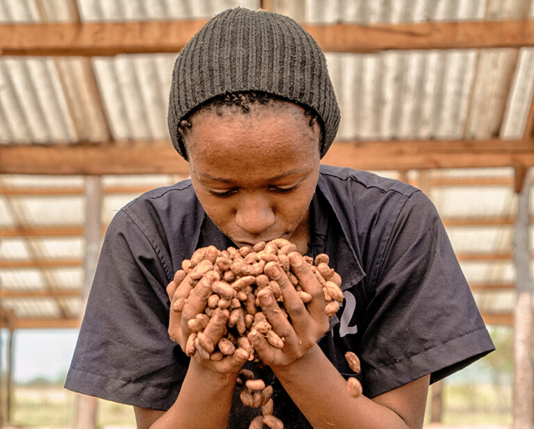 Woman working at the processing station. Source: Latitude